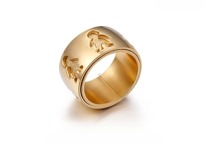 Detailed view of 12mm wide 18K gold plated ring with boy and girl hollow engravings