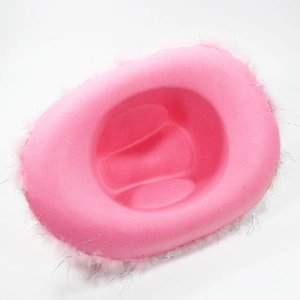 Close-up of bright pink felt cowboy hat with fluffy feather trim and silver tinsel details