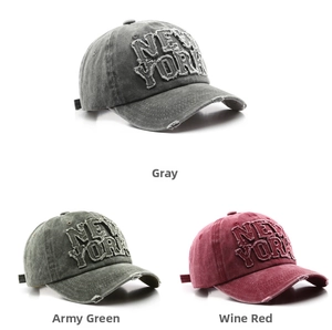 Detailed view of vintage washed cotton baseball caps with New York embroidery in three colors
