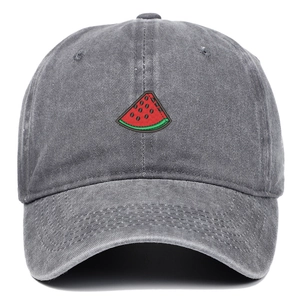 Macro detail of watermelon slice embroidery on grey washed denim baseball cap
