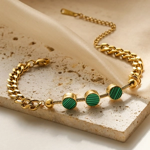 Minimalist gold titanium steel layered bracelet featuring green shell malachite beads