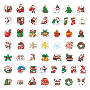 Close-up of assorted vinyl Christmas stickers featuring Santa, reindeer and festive patterns