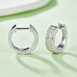 Close-up of S925 sterling silver hoop earrings with triple rows of micro-pave zircons