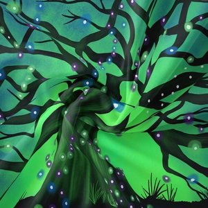Detailed close-up of a bohemian mandala tapestry with vibrant green fantasy tree patterns