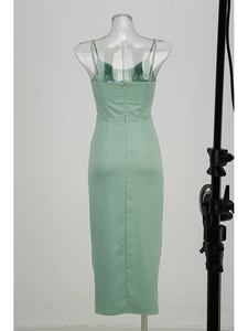 Detail of mint green slip dress back with invisible zipper and corset style lacing