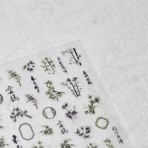 Adesivi per unghie giapponesi retrò con grafiche di bambù verde e calligrafia cinese