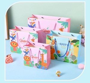 Cartoon animal gift bags in pink and blue colors with woven handles and various sizes