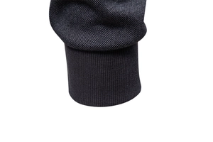 Detailed close-up of charcoal men's hoodie featuring honeycomb texture and ribbed cuffs