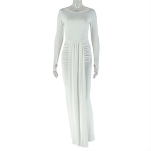 Detail of the waist pleats and draped hem on a white long sleeve slim fit dress