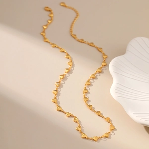 Minimalist handmade 18K gold-plated copper necklace featuring tiny heart-shaped charms