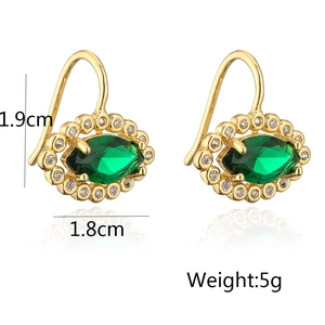 Detailed view of 18K gold plated butterfly earrings with green zircon and size specs