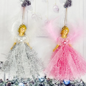 Close-up of cute Christmas angel doll hanging ornaments with feather wings and glitter skirts