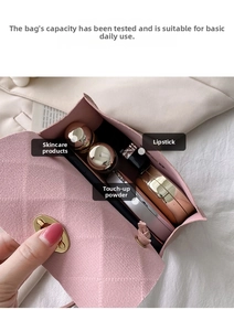 Pink quilted mini bag interior showing capacity for lipstick and skincare items