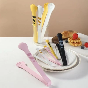 Cat paw silicone food tongs in various colors and patterns for BBQ and bread serving