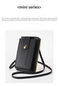 Detail of black lychee grain leather crossbody bag with elegant gold round buckle closure
