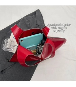 Macro view of the large capacity red glossy tote bag interior storage for daily items