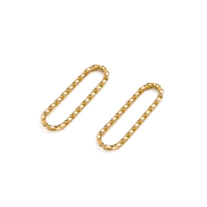 Detailed close-up of two golden twisted oval connectors made of gold-plated stainless steel
