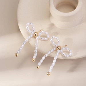 French style bow knot drop earrings with imitation pearls and gold metal accents