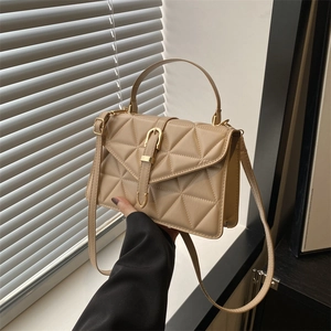 Chic beige quilted small crossbody bag for women with golden metal buckle clasp