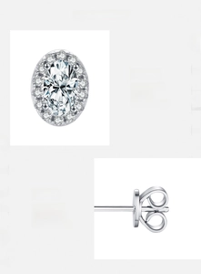 Detail of s925 sterling silver halo stud earrings with oval cut cubic zirconia