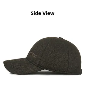 Side view detail of brown winter baseball cap with embroidered SPORT text and fabric texture