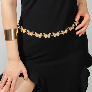 Elegant gold butterfly waist chain accessory for summer dresses and jeans stylishly displayed