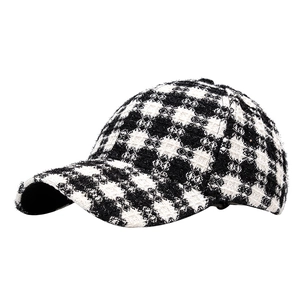 Women's autumn houndstooth baseball cap in black and white tweed with retro texture