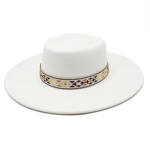 Detail of white wide brim wool fedora with bohemian geometric woven headband