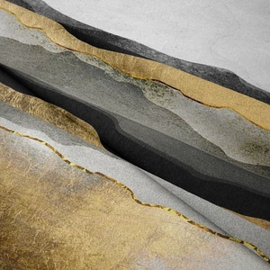 Close-up detail of abstract mountain tapestry with golden lines and modern fabric texture