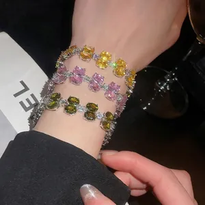 Three-piece set of elegant zircon bracelets with oval-cut yellow, pink and green stones