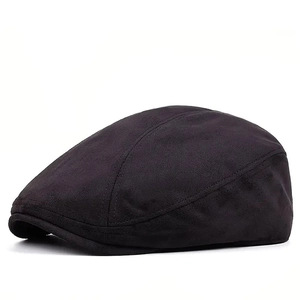 Classic black suede flat cap with short brim and structured vintage newsboy style design