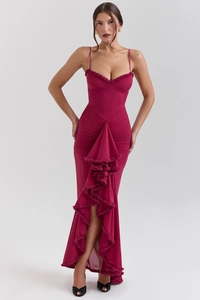 Detail of burgundy maxi dress featuring ruffled hemline and gathered pleated texture
