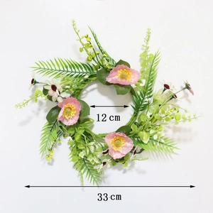 Detail shot of a 33cm floral wreath with pink wildflowers and size markings