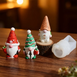 Christmas Gnome candle silicone mold with finished resin figurines on wood base