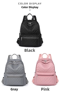 Vista detallada de mochilas de nailon acolchado en colores negro, gris y rosa suave