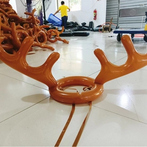 Inflatable reindeer antlers for Christmas toss game in vibrant orange PVC material