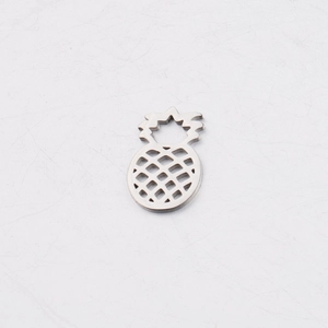 Detailed close-up of hollowed-out pineapple pendant made of polished mirror stainless steel