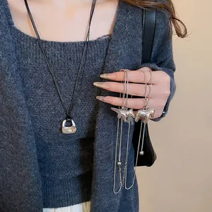 Minimalist brushed metal horse and bag pendant necklaces with stylish leather cord chain