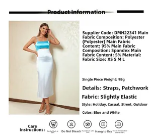 Détail de la robe moulante bleu et blanc montrant les coutures et la texture soie