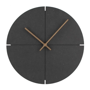Macro view of modern Nordic wall clock with wooden hands and textured black clock face