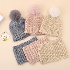 Baby knitted beanie and scarf set with faux fur pom-poms in three pastel colors