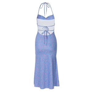 Detail of floral backless halter dress showing pink flower print and lace-up back