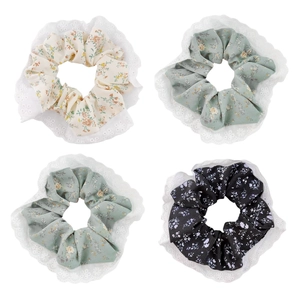 Set of four 12cm floral scrunchies with lace trim in beige, green, and black floral patterns