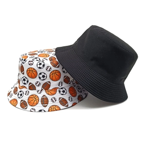 Unisex cotton bucket hats in solid black and sports ball patterns for sun protection