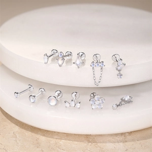 Macro shot of S925 sterling silver earrings set with moonstones in various shapes