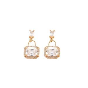 Elegant square zircon earrings with gold handbag pendant design on white background