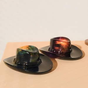 Cowboy hat resin molds for jewelry trays with green and purple nebula nebula textures