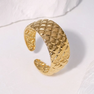 Minimalist gold quilted stainless steel open ring with a vintage glossy finish