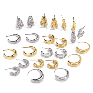 14k gold and silver stainless steel earrings in various C-shape and twisted designs