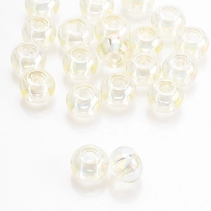 Macro detail of clear iridescent large-hole glass beads for DIY jewelry making